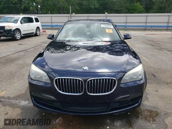 2014 BMW 7 Series 740i z VIN WBAYA6C50ED144168, wystawiony jako Copart lot #57034655 z przebiegiem 118 806 mil mil oraz Szkoda całkowita • Salvage title. Historia ofert i sprzedaży dostępna na DreamBid. Obrazek 5.