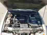 2000 Saturn SL with VIN 1G8ZK5274YZ103237, listed as a Copart auction lot 60558105 with 126,320 mi miles and Salvage title. Bid and sale history available at DreamBid. Image 11.