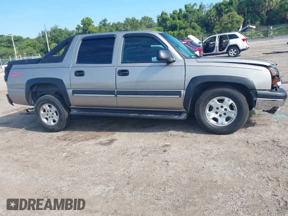 2003 Chevrolet Avalanche with VIN 3GNEC13T23G315110, listed as a IAAI auction lot 43092593 with 204,732 mi miles and . Bid and sale history available at DreamBid. Image 13.