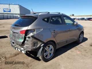 2012 Hyundai Tucson GLS z VIN KM8JUCAC0CU543165, wystawiony jako Copart lot #82542645 z przebiegiem 108 240 mil mil oraz Szkoda całkowita • Salvage title. Historia ofert i sprzedaży dostępna na DreamBid. Obrazek 3.