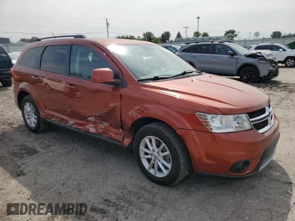2013 Dodge Journey SXT with VIN 3C4PDCBG8DT577947, listed as a Copart auction lot 71614805 with 182,477 mi miles and Salvage title. Bid and sale history available at DreamBid. Image 4.