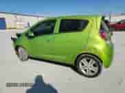 2014 Chevrolet Spark LS with VIN KL8CB6S94EC565436, listed as a Copart auction lot 86057295 with 106,927 mi miles and Salvage title. Bid and sale history available at DreamBid. Image 2.