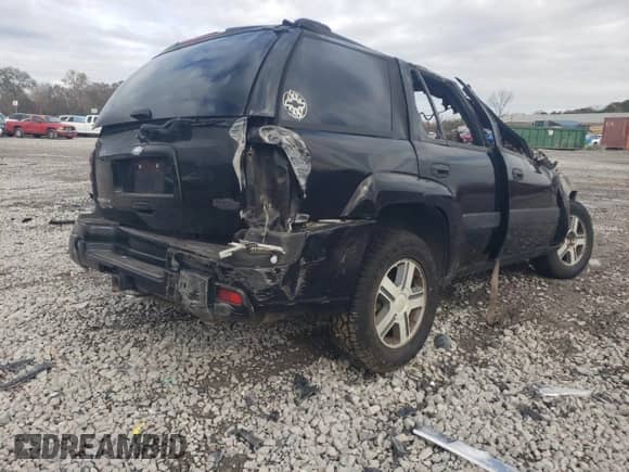 2005 Chevrolet TrailBlazer LS с VIN 1GNDS13S452121647, выставлен на аукционе Copart как лот 76577833 с пробегом Не указан миль и Списание • Salvage title. История ставок и продаж доступна на DreamBid. Изображение 3.