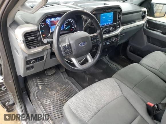 2021 Ford F-150 XL z VIN 1FTMF1EP7MKE58611, wystawiony jako Copart lot #56912955 z przebiegiem 30 850 mil mil oraz Szkoda całkowita • Salvage title. Historia ofert i sprzedaży dostępna na DreamBid. Obrazek 8.