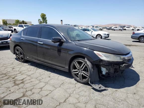 2017 Honda Accord Touring with VIN 1HGCR3F94HA036601, listed as a Copart auction lot 64644345 with 188,749 mi miles and Salvage title. Bid and sale history available at DreamBid. Image 4.