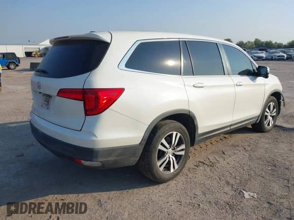 2016 Honda Pilot EX-L with VIN 5FNYF5H50GB015575, listed as a IAAI auction lot 43203296 with 183,086 mi miles and . Bid and sale history available at DreamBid. Image 4.