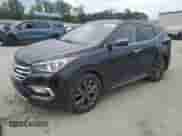 2018 Hyundai Santa Fe Ultimate с VIN 5XYZW4LA9JG555798, выставлен на аукционе Copart как лот 80665715 с пробегом 126 971 миль миль и Списание • Salvage title. История ставок и продаж доступна на DreamBid. Изображение 1.