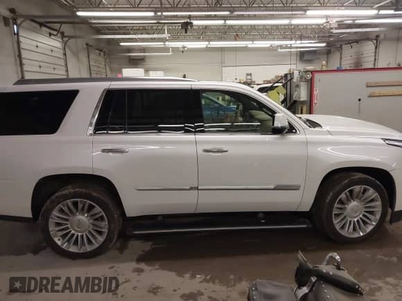 2018 Cadillac Escalade Platinum with VIN 1GYS4DKJ8JR199087, listed as a IAAI auction lot 42062074 with 97,751 mi miles and . Bid and sale history available at DreamBid. Image 14.