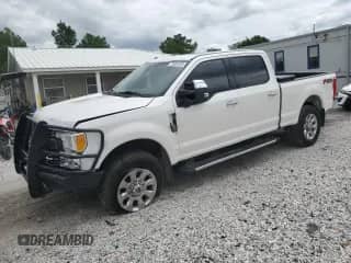2017 Ford F-250 Lariat z VIN 1FT7W2B66HED41900, wystawiony jako Copart lot #70997035 z przebiegiem 134 393 mil mil oraz Szkoda całkowita • Salvage title. Historia ofert i sprzedaży dostępna na DreamBid. Obrazek 1.