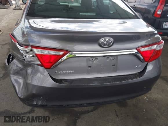 2017 Toyota Camry LE with VIN 4T1BF1FK8HU703979, listed as a IAAI auction lot 43283651 with 59,852 mi miles and . Bid and sale history available at DreamBid. Image 6.