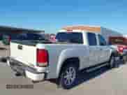2013 GMC Sierra 1500 Denali z VIN 3GTP2XE24DG345268, wystawiony jako IAAI lot #43357777 z przebiegiem 168 765 mil mil oraz . Historia ofert i sprzedaży dostępna na DreamBid. Obrazek 4.