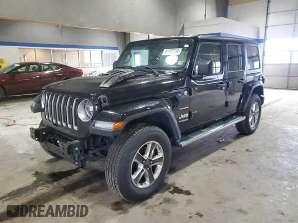 2021 Jeep Wrangler Unlimited Sahara High Altitude with VIN 1C4HJXEG9MW571844, listed as a Copart auction lot 81482334 with 77,409 mi miles and Salvage title. Bid and sale history available at DreamBid. Image 1.