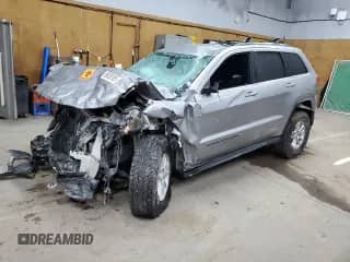 2018 Jeep Grand Cherokee Laredo E with VIN 1C4RJFAG3JC184711, listed as a Copart auction lot 69828195 with Not provided miles and Salvage title. Bid and sale history available at DreamBid. Image 1.