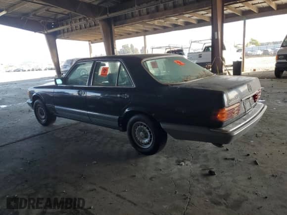 1985 Mercedes-Benz 380 with VIN WDBCA32D9FA190068, listed as a Copart auction lot 87005525 with 115,518 mi miles and Clean title. Bid and sale history available at DreamBid. Image 2.