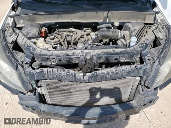 2016 Chevrolet Traverse LT z VIN 1GNKRGKD3GJ242784, wystawiony jako Copart lot #68963925 z przebiegiem Nie podano mil oraz Szkoda całkowita • Salvage title. Historia ofert i sprzedaży dostępna na DreamBid. Obrazek 12.