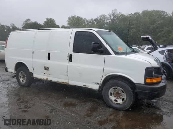 2011 Chevrolet Express Cargo with VIN 1GCWGFCA1B1123865, listed as a Copart auction lot 71970295 with 367,891 mi miles and Salvage title. Bid and sale history available at DreamBid. Image 4.