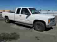 1996 Chevrolet Silverado 2500 с VIN 1GCGC29RXTE267110, выставлен на аукционе Copart как лот 50030575 с пробегом 259 378 миль миль и Списание • Salvage title. История ставок и продаж доступна на DreamBid. Изображение 4.