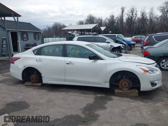 2015 Nissan Altima S with VIN 1N4AL3AP1FC212833, listed as a IAAI auction lot 41368621 with 148,160 mi miles and . Bid and sale history available at DreamBid. Image 13.