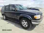 1999 Ford Explorer XLT с VIN 1FMZU35P7XZB15392, выставлен на аукционе Copart как лот 80508835 с пробегом 295 559 миль миль и Списание • Salvage title. История ставок и продаж доступна на DreamBid. Изображение 4.