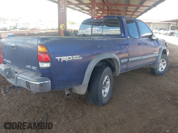 2001 Toyota Tundra SR5 z VIN 5TBBT441X1S190682, wystawiony jako IAAI lot #43209023 z przebiegiem Nie podano mil oraz . Historia ofert i sprzedaży dostępna na DreamBid. Obrazek 4.