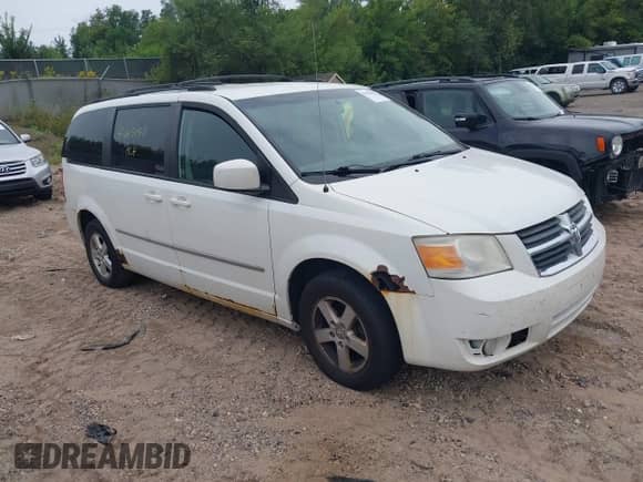 2010 Dodge Grand Caravan SXT with VIN 2D4RN5D16AR342815, listed as a IAAI auction lot 43043040 with 302,074 mi miles and . Bid and sale history available at DreamBid. Image 1.