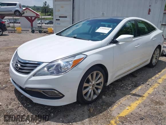 2017 Hyundai Azera Limited z VIN KMHFH4JGXHA588500, wystawiony jako IAAI lot #42888010 z przebiegiem 131 310 mil mil oraz . Historia ofert i sprzedaży dostępna na DreamBid. Obrazek 18.