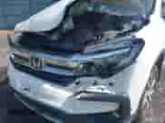 2021 Honda Pilot EX z VIN 5FNYF6H38MB072297, wystawiony jako IAAI lot #42561276 z przebiegiem 119 172 mil mil oraz . Historia ofert i sprzedaży dostępna na DreamBid. Obrazek 6.