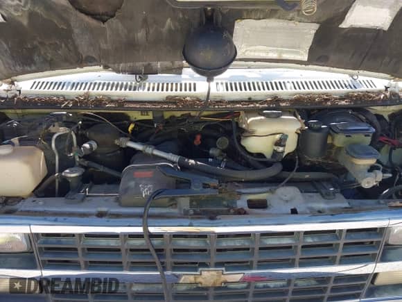 1993 Chevrolet Chevy Van z VIN 1GBEG25K5PF330218, wystawiony jako IAAI lot #42321737 z przebiegiem 203 157 mil mil oraz . Historia ofert i sprzedaży dostępna na DreamBid. Obrazek 10.