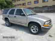 2000 Chevrolet Blazer LS z VIN 1GNCS13W2Y2395156, wystawiony jako Copart lot #65617525 z przebiegiem 140 108 mil mil oraz Szkoda całkowita • Salvage title. Historia ofert i sprzedaży dostępna na DreamBid. Obrazek 4.