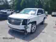 2017 Chevrolet Tahoe Premier with VIN 1GNSKCKC6HR248439, listed as a IAAI auction lot 40014860 with 97,983 mi miles and . Bid and sale history available at DreamBid. Image 2.