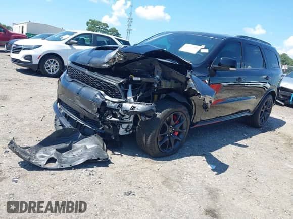 2024 Dodge Durango SRT 392 Plus with VIN 1C4SDJGJ8RC154212, listed as a IAAI auction lot 42712350 with 1,261 mi miles and . Bid and sale history available at DreamBid. Image 2.