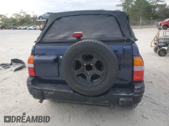 2001 Chevrolet Tracker with VIN 2CNBE18C816911034, listed as a Copart auction lot 88693025 with Not provided miles and Salvage title. Bid and sale history available at DreamBid. Image 6.