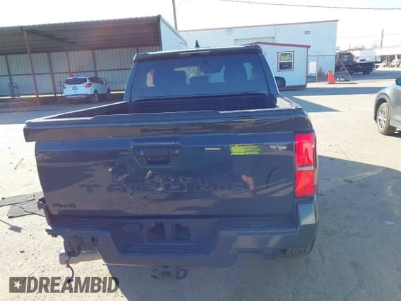2024 Toyota Tacoma SR5 with VIN 3TYLB5JN0RT029530, listed as a IAAI auction lot 41213742 with 5,370 mi miles and . Bid and sale history available at DreamBid. Image 16.
