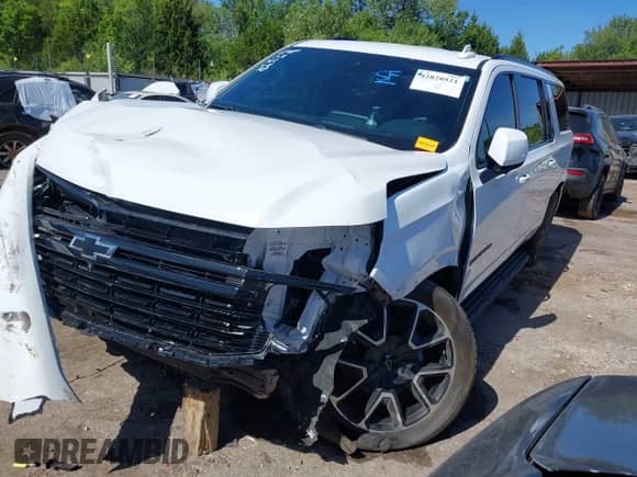 2023 Chevrolet Suburban RST с VIN 1GNSKEKD6PR559999, выставлен на аукционе IAAI как лот 42820521 с пробегом 24 075 миль миль и . История ставок и продаж доступна на DreamBid. Изображение 18.