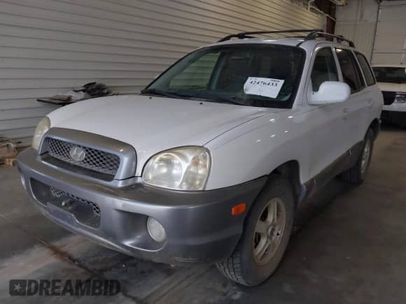 2003 Hyundai Santa Fe GLS with VIN KM8SC13D03U390028, listed as a IAAI auction lot 42476433 with 173,957 mi miles and . Bid and sale history available at DreamBid. Image 2.