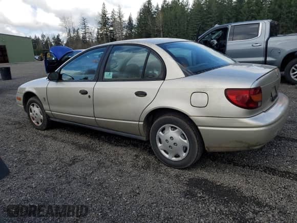 2001 Saturn SL with VIN 1G8ZG52851Z213567, listed as a Copart auction lot 51795795 with Not provided miles and Salvage title. Bid and sale history available at DreamBid. Image 2.