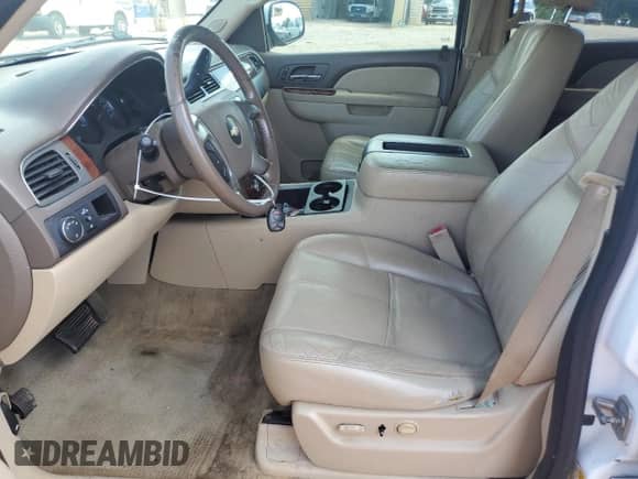 2012 Chevrolet Tahoe LT with VIN 1GNSCBE06CR119764, listed as a Copart auction lot 64947715 with 236,981 mi miles and Salvage title. Bid and sale history available at DreamBid. Image 7.