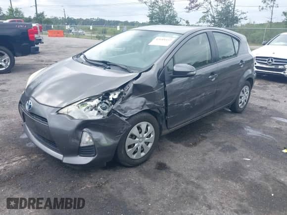 2013 Toyota Prius One z VIN JTDKDTB30D1547971, wystawiony jako IAAI lot #43189377 z przebiegiem 164 838 mil mil oraz . Historia ofert i sprzedaży dostępna na DreamBid. Obrazek 2.