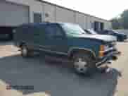 1997 Chevrolet Suburban with VIN 3GNFK16RXVG114579, listed as a Copart auction lot 57333295 with 117,040 mi miles and Salvage title. Bid and sale history available at DreamBid. Image 4.
