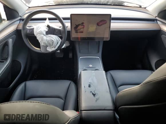 2023 Tesla Model Y Long Range with VIN 7SAYGAEE4PF668889, listed as a Copart auction lot 67239314 with 26,874 mi miles and Salvage title. Bid and sale history available at DreamBid. Image 8.