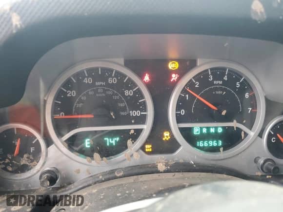 2007 Jeep Wrangler Unlimited Rubicon with VIN 1J4GA69117L112867, listed as a Copart auction lot 59909565 with 166,963 mi miles and Salvage title. Bid and sale history available at DreamBid. Image 9.