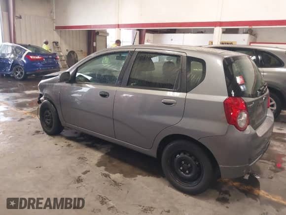 2011 Chevrolet Aveo 1LT z VIN KL1TD6DEXBB204748, wystawiony jako IAAI lot #42596764 z przebiegiem 168 663 mil mil oraz . Historia ofert i sprzedaży dostępna na DreamBid. Obrazek 3.