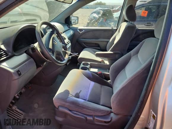 2006 Honda Odyssey LX с VIN 5FNRL38286B008704, выставлен на аукционе Copart как лот 85199205 с пробегом 233 143 миль миль и Списание • Salvage title. История ставок и продаж доступна на DreamBid. Изображение 7.