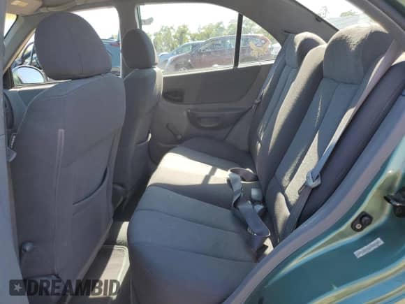 2004 Hyundai Accent GL z VIN KMHCG45C24U503929, wystawiony jako Copart lot #71820915 z przebiegiem 146 643 mil mil oraz Szkoda całkowita • Salvage title. Historia ofert i sprzedaży dostępna na DreamBid. Obrazek 10.