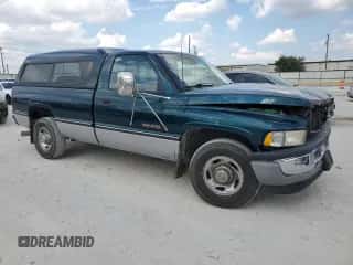 1996 Dodge RAM z VIN 1B7KC26C9TS629679, wystawiony jako Copart lot #69828344 z przebiegiem 198 659 mil mil oraz Szkoda całkowita • Salvage title. Historia ofert i sprzedaży dostępna na DreamBid. Obrazek 4.