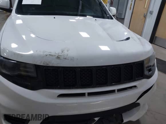 2018 Jeep Grand Cherokee SRT z VIN 1C4RJFDJXJC154046, wystawiony jako IAAI lot #42062169 z przebiegiem 64 953 mil mil oraz . Historia ofert i sprzedaży dostępna na DreamBid. Obrazek 12.