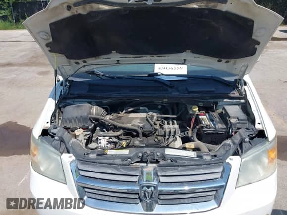 2009 Dodge Grand Caravan SXT with VIN 2D8HN54159R626944, listed as a IAAI auction lot 43056559 with 220,711 mi miles and . Bid and sale history available at DreamBid. Image 10.