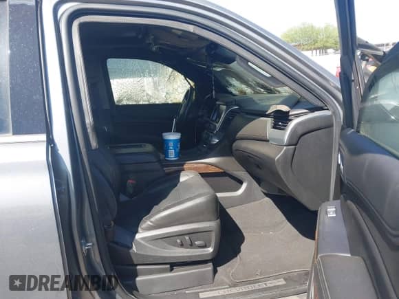 2020 Chevrolet Suburban LT with VIN 1GNSKHKC1LR156323, listed as a IAAI auction lot 42541369 with Not provided miles and . Bid and sale history available at DreamBid. Image 5.