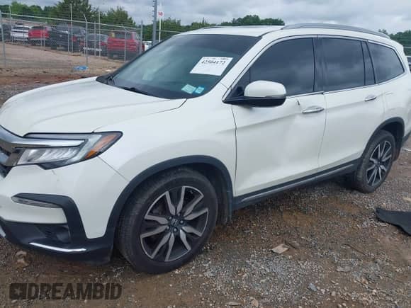 2019 Honda Pilot Touring 7-Passenger z VIN 5FNYF6H63KB078886, wystawiony jako IAAI lot #42504172 z przebiegiem 87 662 mil mil oraz . Historia ofert i sprzedaży dostępna na DreamBid. Obrazek 2.