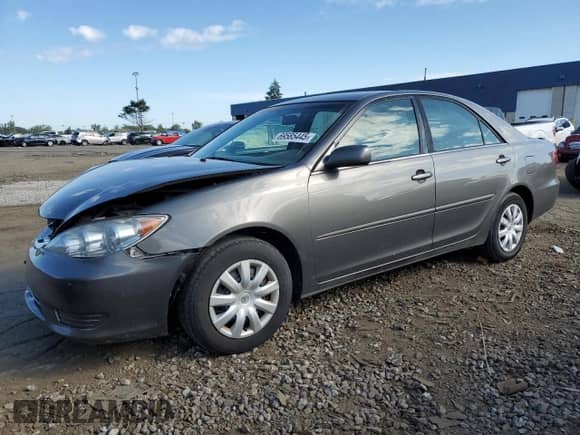 2005 Toyota Camry STD with VIN 4T1BE32K35U601652, listed as a Copart auction lot 69585445 with 210,650 mi miles and Salvage title. Bid and sale history available at DreamBid. Image 1.